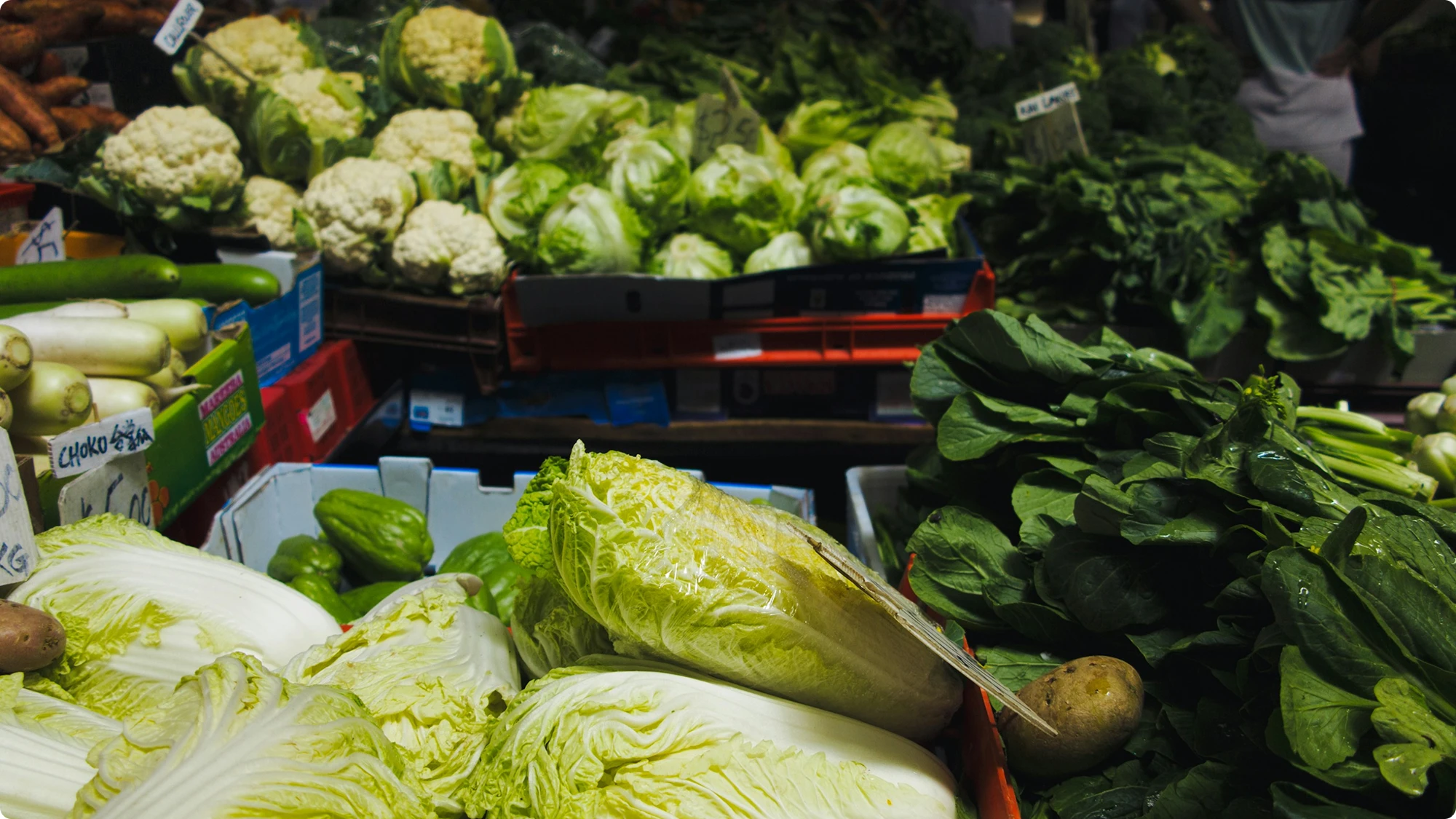 Market stall with cauliflowers and other vegetables