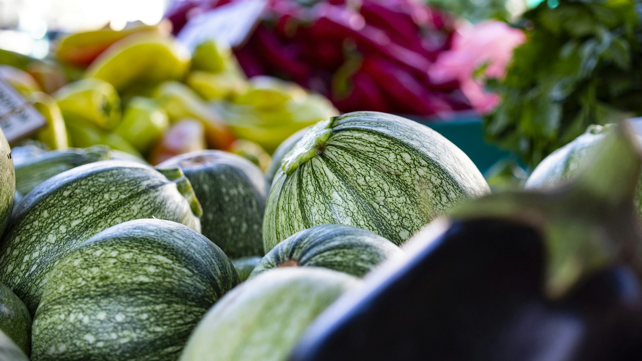 Market stall with melons and pumpkins